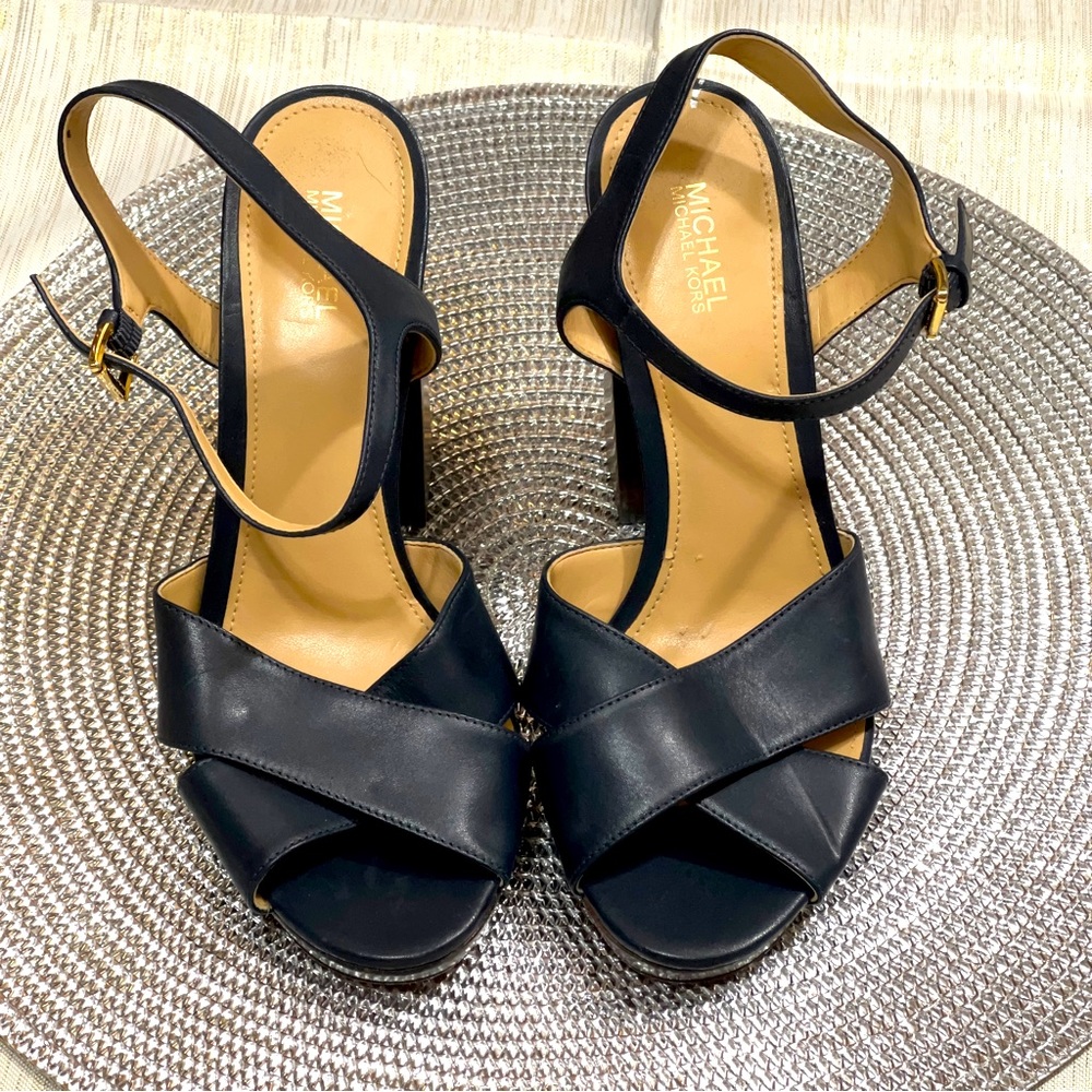 Michael Kors dark navy blue pumps. Wore one time. Great condition.